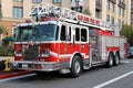 American fire truck parked near a residential building