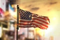American Flag Against City Blurred Background At Sunrise Backlight Royalty Free Stock Photo