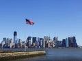 American flag against Manhattan skyline