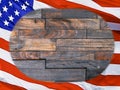 American Flag against a wood background with copy space. Royalty Free Stock Photo