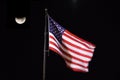 American Flag blowing in the night sky