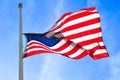 American flag blowing in the wind Royalty Free Stock Photo