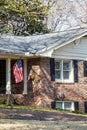 American Flag on Brick Home Royalty Free Stock Photo