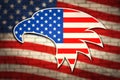 American flag on brick wall with patriotic symbols of the United States of America. Eagle head in front of the flag of the USA on