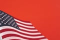 American flag close up on red background with copy space. Patriotism, symbol, background, concept Royalty Free Stock Photo