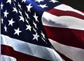 American Flag Closeup fills the frame with red white and blue stars and stripes Royalty Free Stock Photo