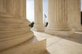 American flag between columns of Supreme Court Royalty Free Stock Photo