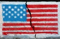 American flag on a cracked wall