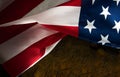 American flag on a dark wood background with space for text Royalty Free Stock Photo