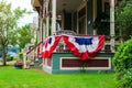 American flag decor on victorian porch Royalty Free Stock Photo