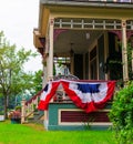 American flag decor on victorian porch Royalty Free Stock Photo