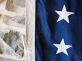 American flag detail against interior stone house wall Royalty Free Stock Photo