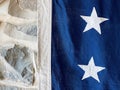 American flag detail against interior stone house wall Royalty Free Stock Photo