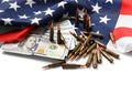 American flag, dollars, bullets, cartridges, ammunition on a white background Royalty Free Stock Photo