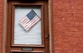 American flag on a door of the house in New York, USA Royalty Free Stock Photo