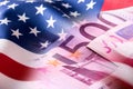 American flag and euro banknotes. Usa flag and euro money Royalty Free Stock Photo