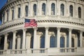 American flag flies by the Capitol building in Washington DC USA Royalty Free Stock Photo