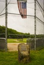 American flag flies over ballfield in Westchester County, New York still closed during Phase 1 of the region`s post pandemic