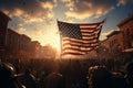 American flag fluttering above the crowd of people against the city street background. American symbol illuminated by Royalty Free Stock Photo