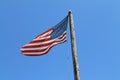 American flag flying from old pole Key West Royalty Free Stock Photo