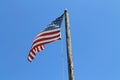 American flag flying from old pole Key West Royalty Free Stock Photo