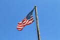 American flag flying from old pole Key West Royalty Free Stock Photo