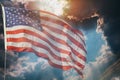 American flag flying, over beautiful Sunset sunrise with clouds, Royalty Free Stock Photo