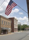 American flag flying over Main Street in Remington Virginia. Royalty Free Stock Photo