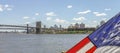 American Flag in front of Brooklyn Bridge