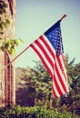 American flag in front of a home Royalty Free Stock Photo