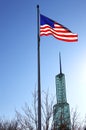 American flag & glass tower. Royalty Free Stock Photo