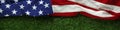 American flag on grass for Memorial Day or Royalty Free Stock Photo