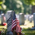 American flag on a gravestone in a cemetery, shallow depth of field Royalty Free Stock Photo