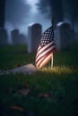 An American Flag on a Gravestone for Veteran\'s Day Royalty Free Stock Photo