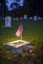 An American Flag on a Gravestone for Veteran\'s Day Royalty Free Stock Photo