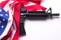 American flag with gun on white background Royalty Free Stock Photo