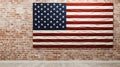 American flag hanging on red brick wall and white wall of a room. Hanging USA flag on red wall Royalty Free Stock Photo