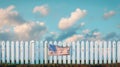 American flag hangs on white picket fence, clear blue sky and fluffy clouds evoke classic suburban dream. Symbol of Royalty Free Stock Photo