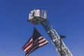 An American Flag is Hoisted Up by a Fire Truck in Remembrance on September 11th, 2018