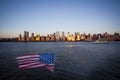 American flag during Independence Day on the Hudson River with a view at Manhattan - New York City - United States Royalty Free Stock Photo