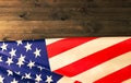 American flag lying on dark wooden background Royalty Free Stock Photo
