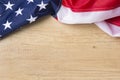 American flag lying on wooden background Royalty Free Stock Photo
