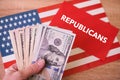 American flag, money and symbol of ballot, Democrats or Republicans? United States House of Representatives elections 2022 Royalty Free Stock Photo