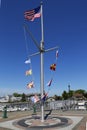 American flag and nautical flags flying at Woodcleft Esplanade in Freeport, Long Island