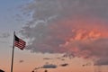 American flag next to pink sky Royalty Free Stock Photo