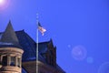 American Flag by old building