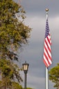 American flag and old fashioned lamp post