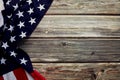 American flag on old rustic wooden board