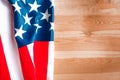 American flag on old wooden background, top view. Royalty Free Stock Photo