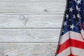 American Flag Over Whitewashed Wood Background For United States Holidays.